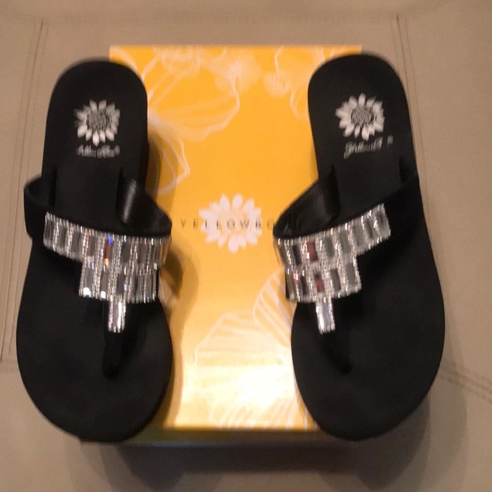 Yellow Box between the toe slides with rhinestone accents. 2 inch wedge Black.